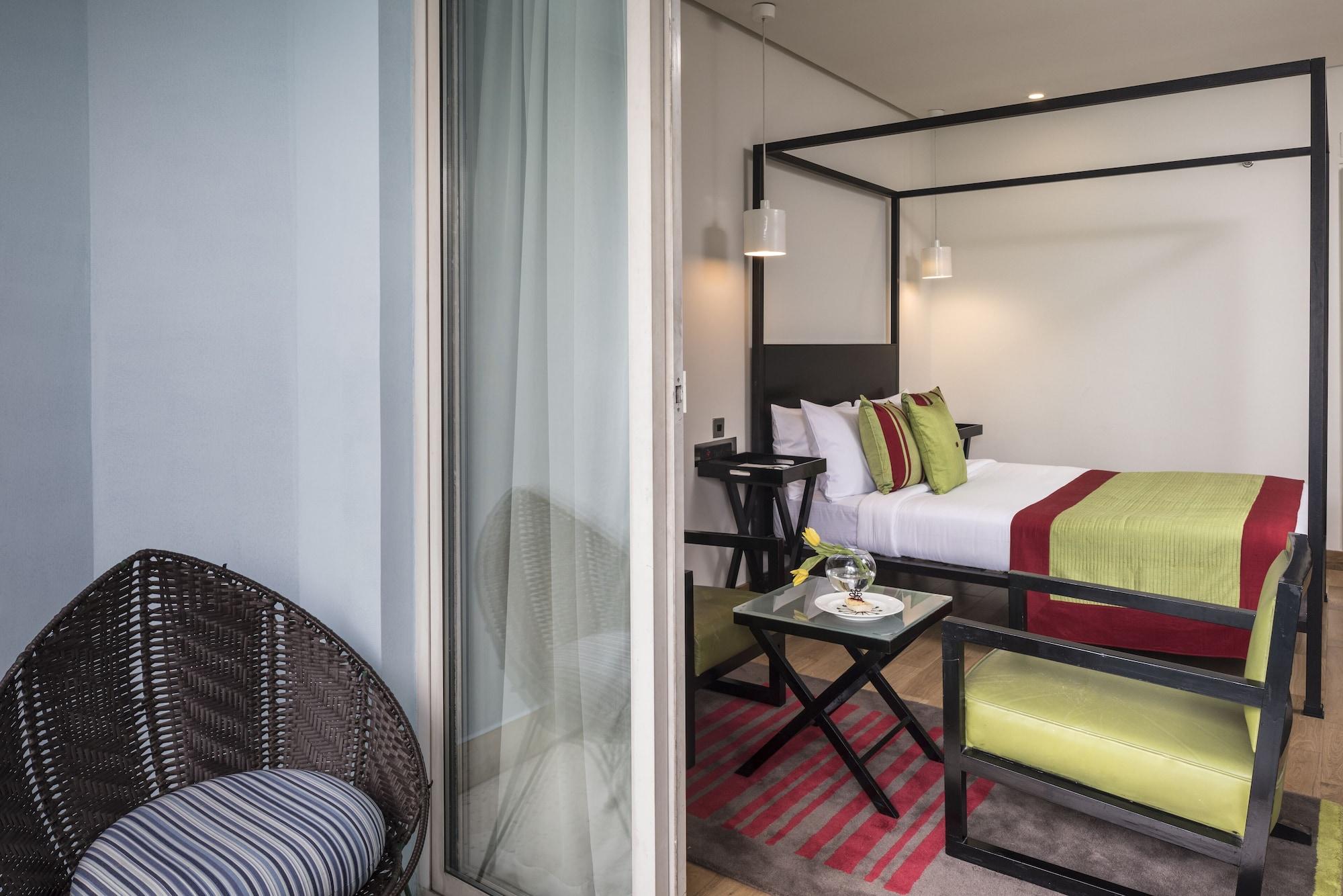 โรงแรมเดอะ พาร์ค บังกาลอร์ ภายนอก รูปภาพ A room at the hotel