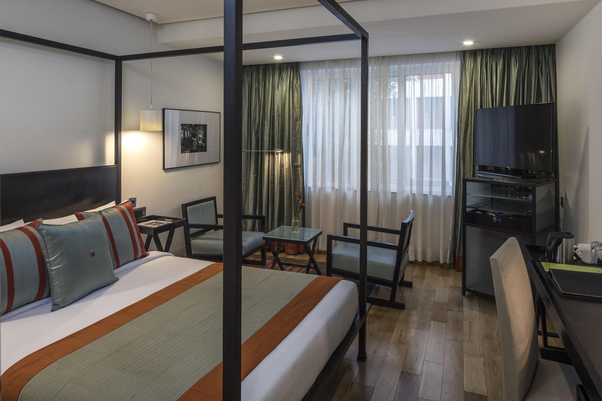 โรงแรมเดอะ พาร์ค บังกาลอร์ ภายนอก รูปภาพ A room at the hotel