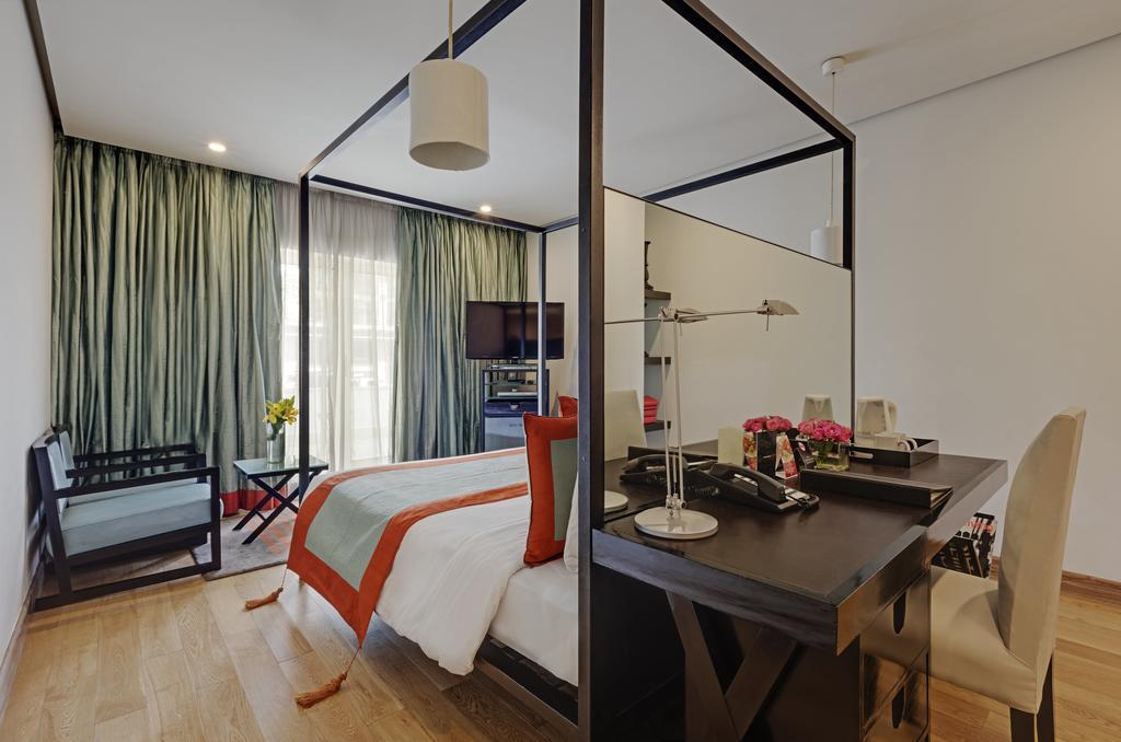 โรงแรมเดอะ พาร์ค บังกาลอร์ ภายนอก รูปภาพ A room at the Park