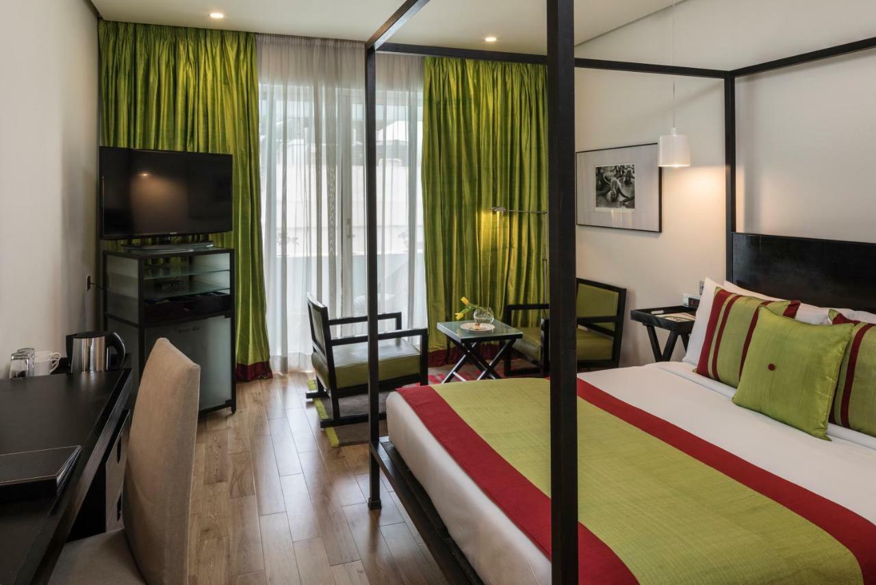 โรงแรมเดอะ พาร์ค บังกาลอร์ ภายนอก รูปภาพ A room at the hotel